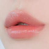 Mitrinošs lūpu spīdums-tinte ar mirdzuma efektu UNLEASHIA Berry Shot Lip Tint